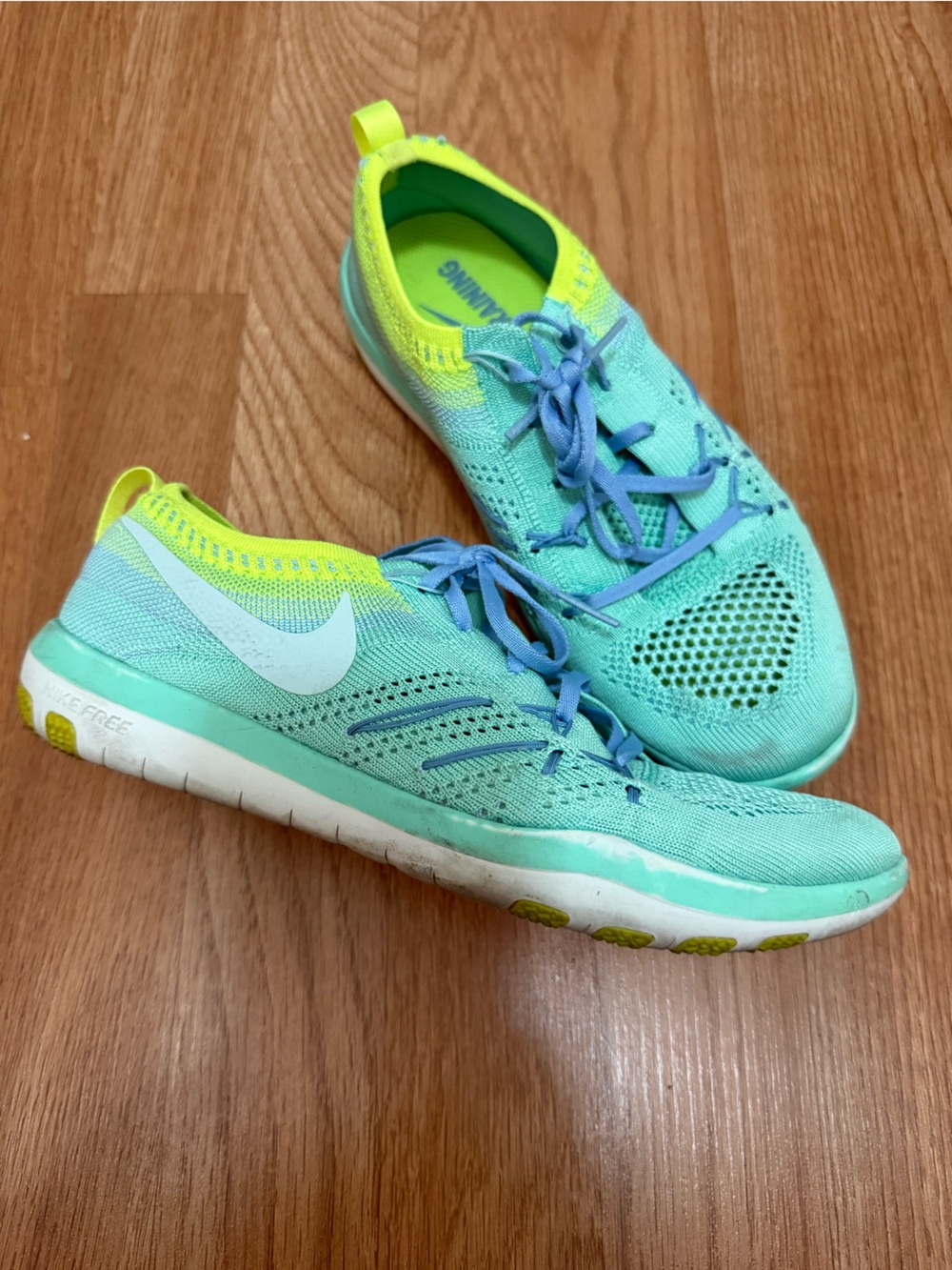 Nike Women's Mint Green Flyknit Running Shoes - 7